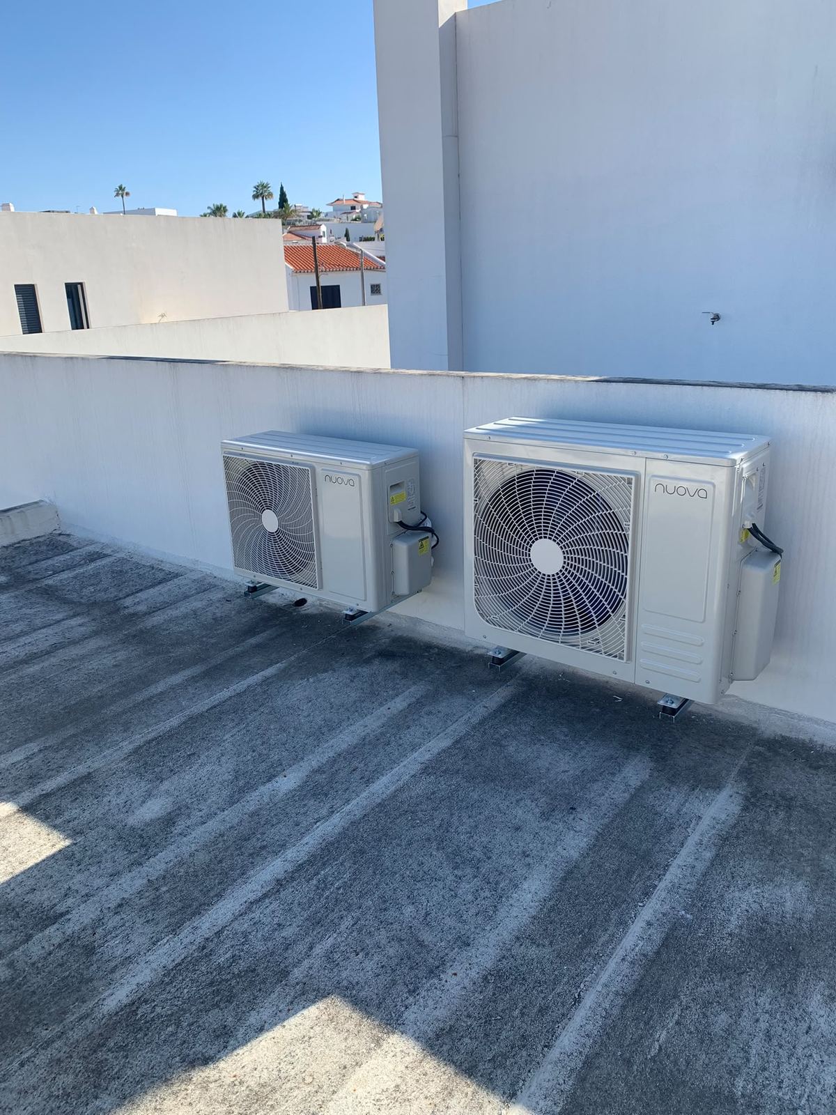 Nuova outdoor units on a flat roof