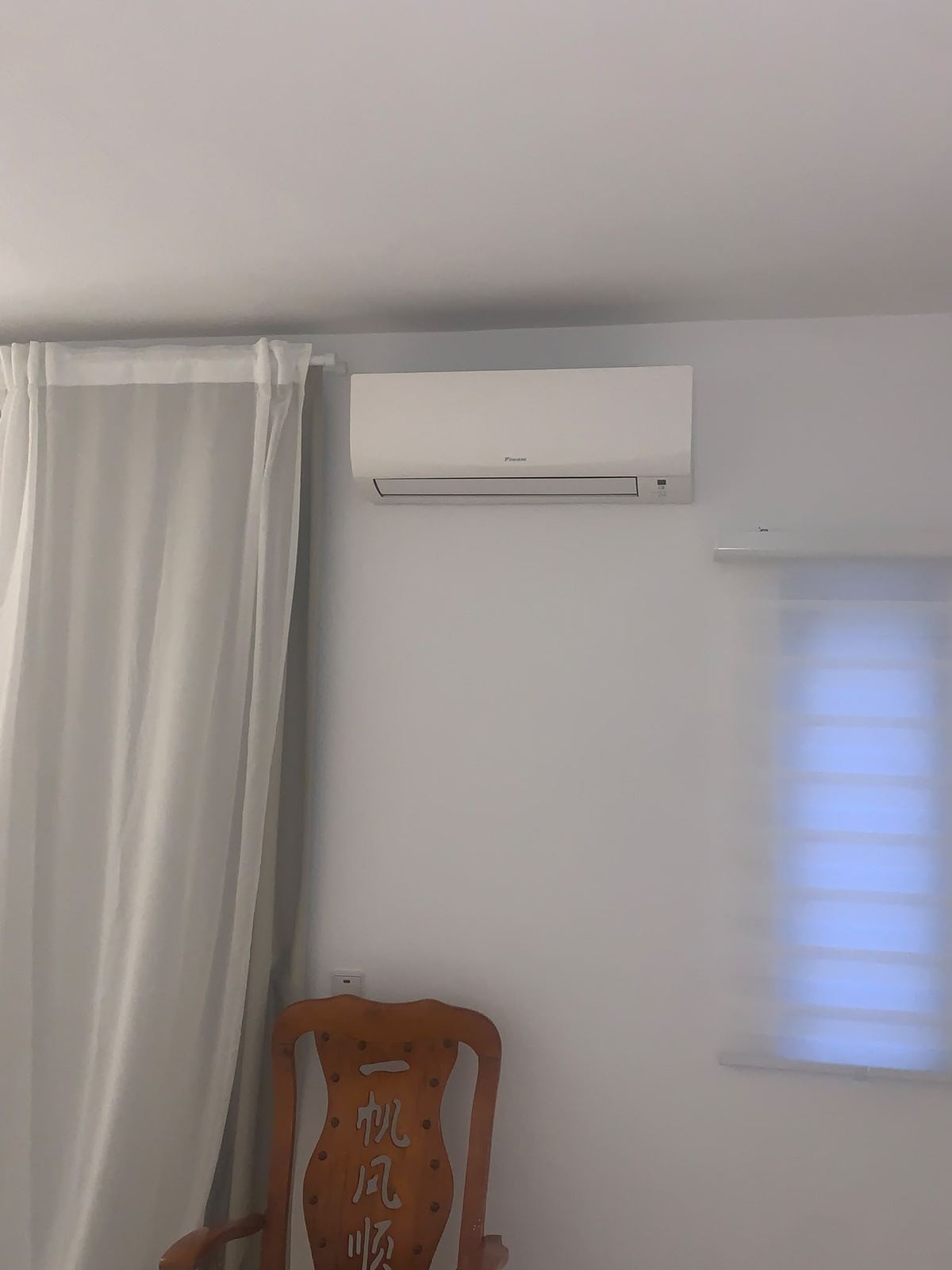 Daikin wall unit in a bedroom