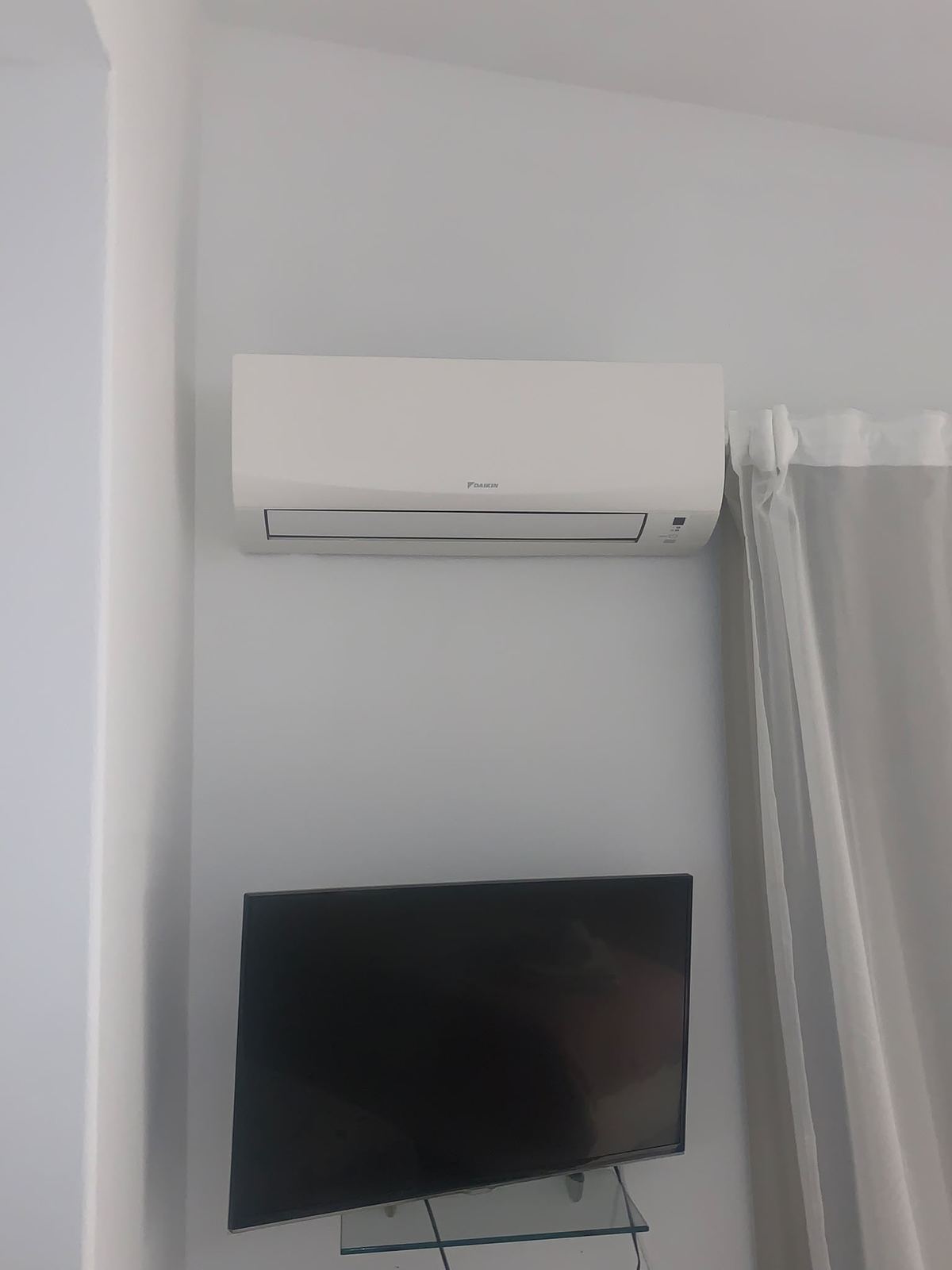 Daikin unit above the TV