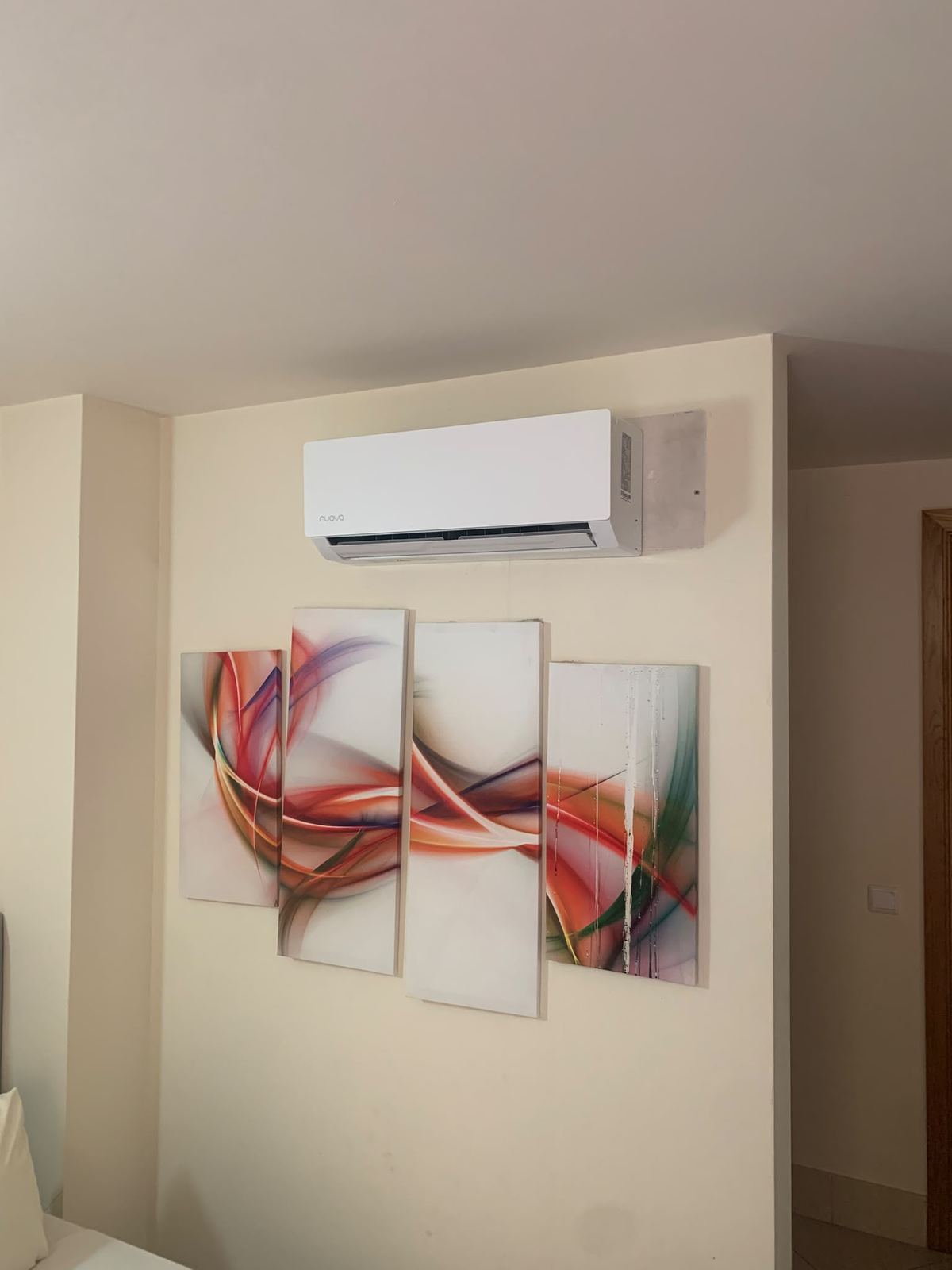 Nuova wall unit in a bedroom