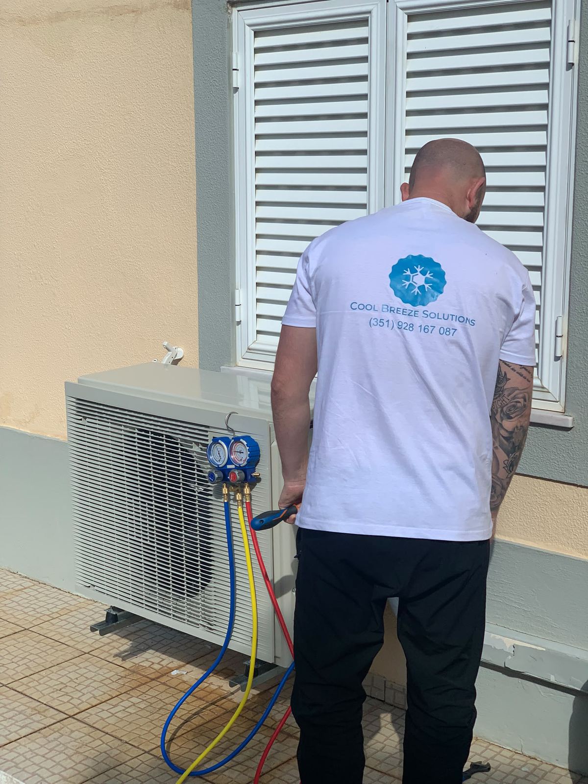 Cool Breeze technician checking system pressures